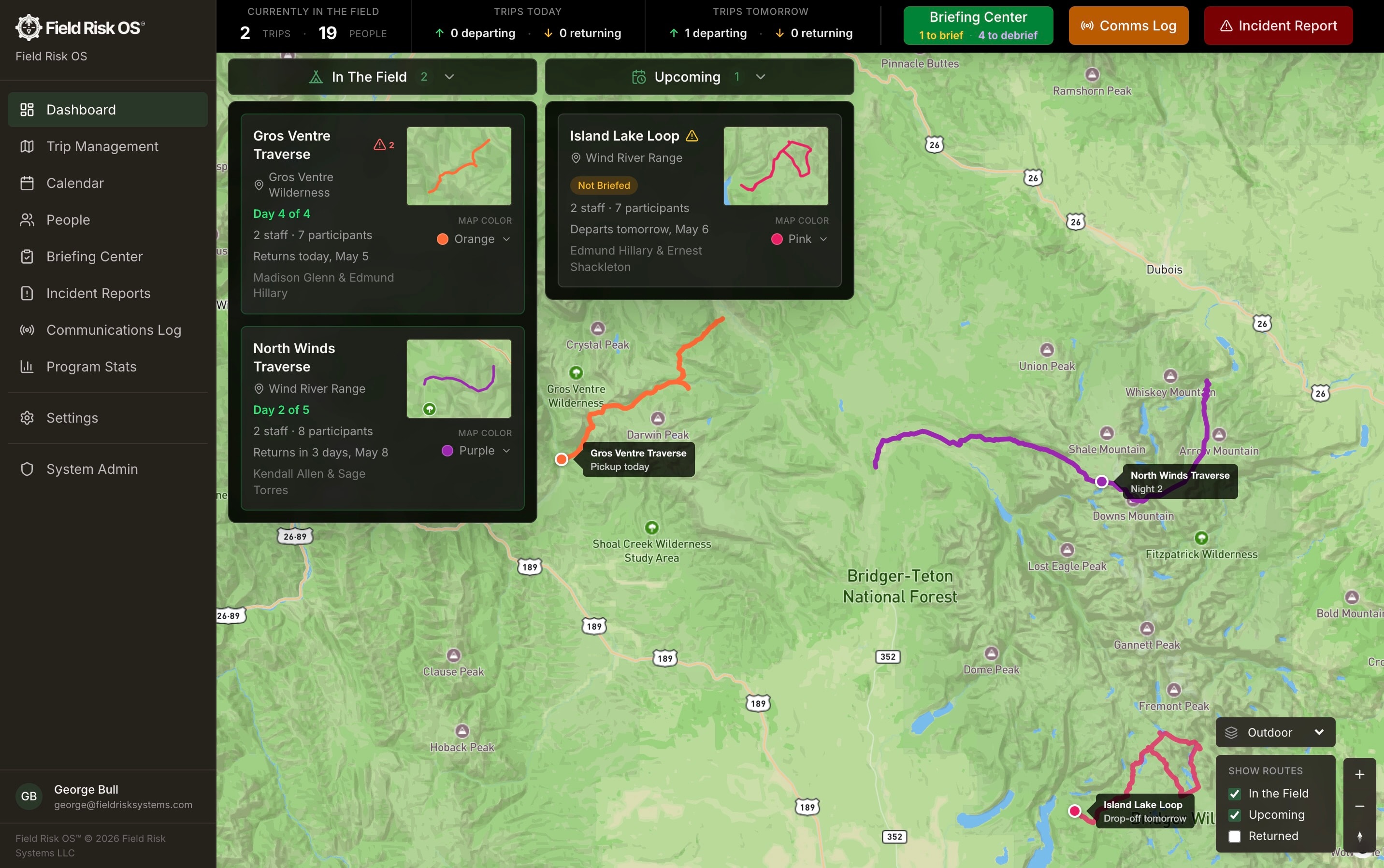 Field Risk OS program dashboard showing active trips as colored routes on a topographic map