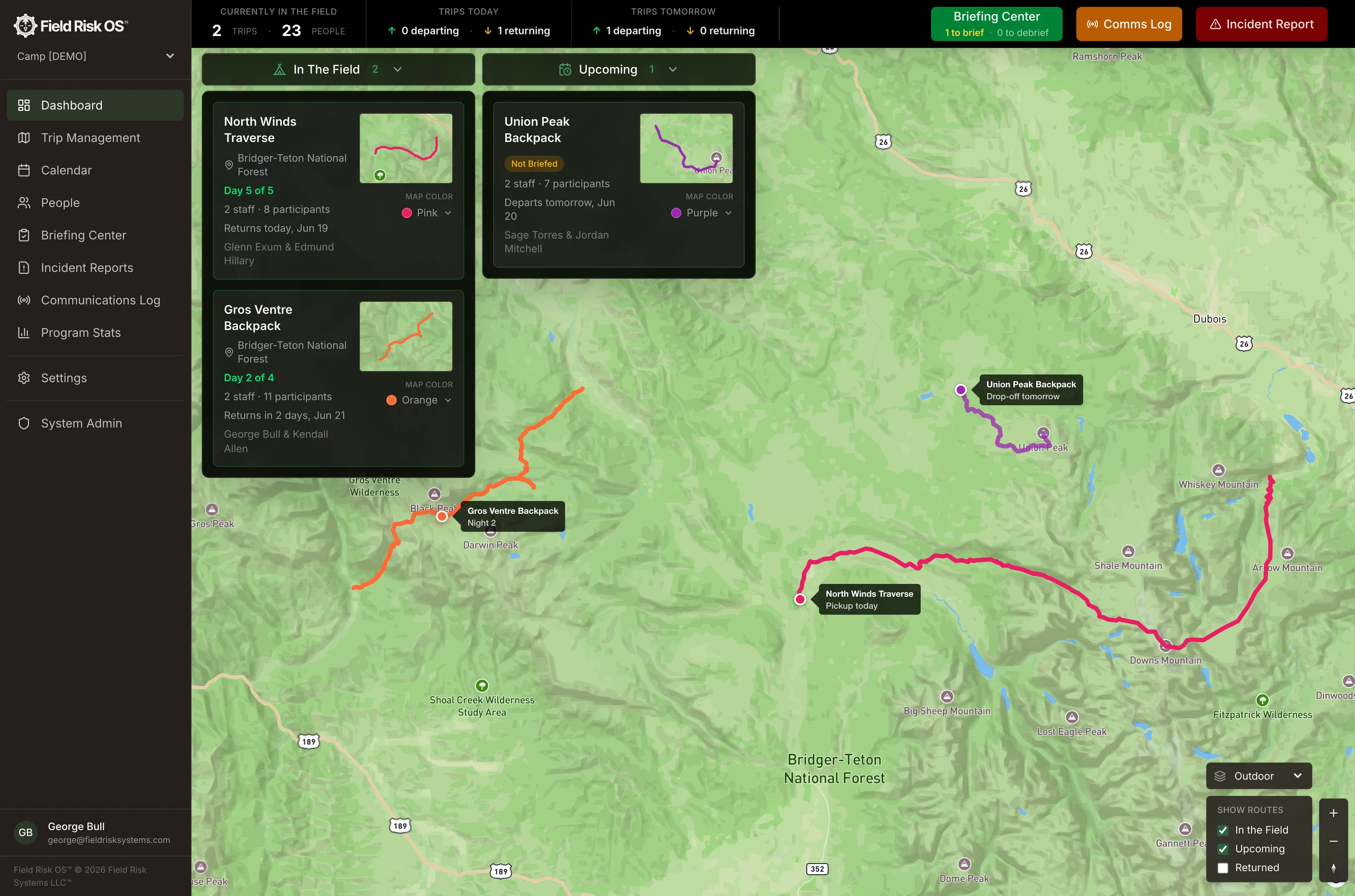 Field Risk OS program dashboard showing active trips as colored routes on a topographic map